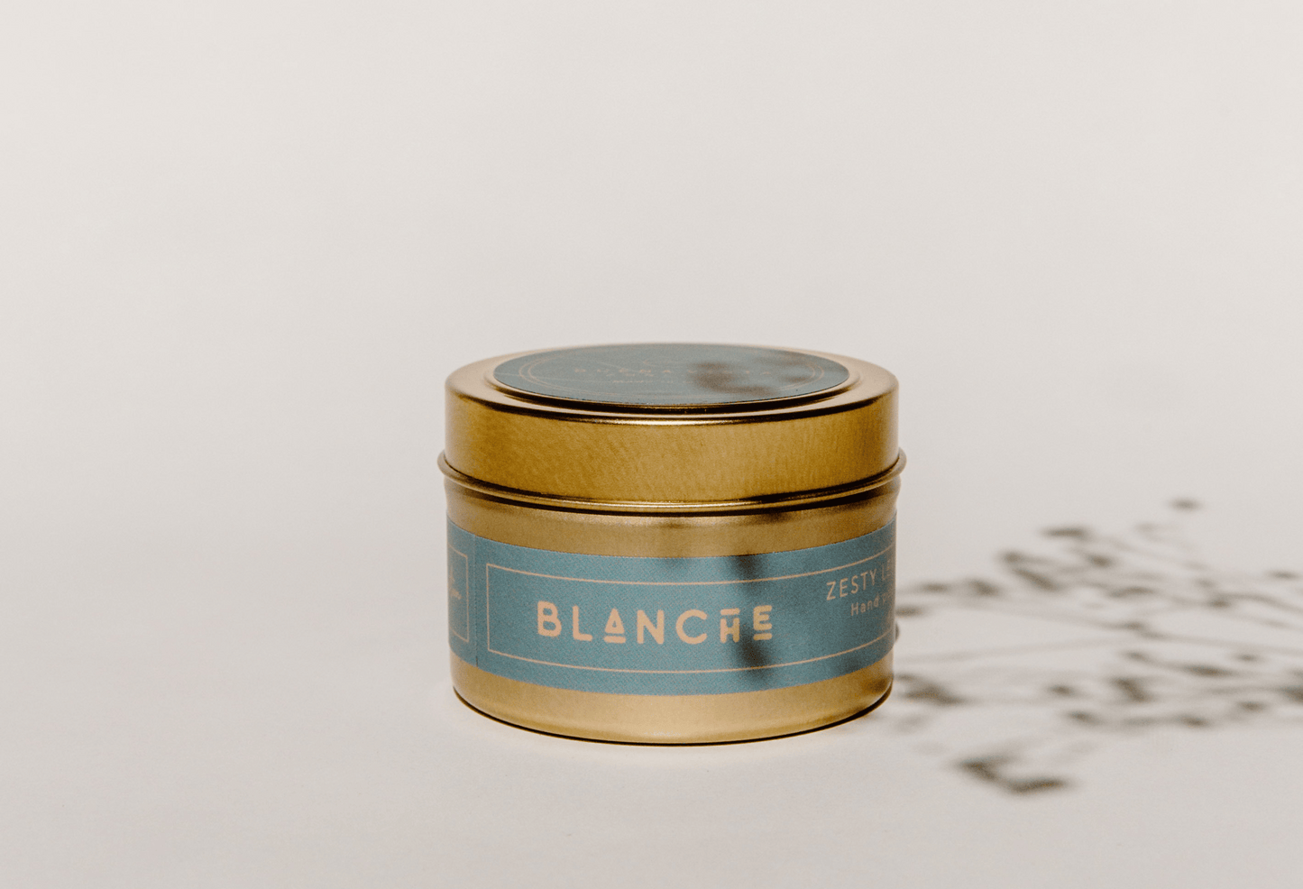 Blanche in Golden Travel Tin